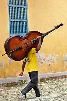 Cuban Culture - Man carrying a bass