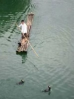 Chinese Culture - Fisherman on the Yulong River